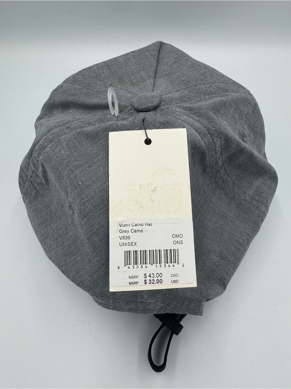 Vuori Gray Five-Panel Adjustable Cap/ Front Patch with faint camo design on brim